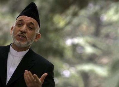کرزی در آمريکا، سربازانش کارگران را ربودند!