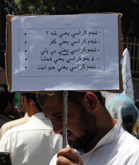 Mullah Omar's supporters rally against women's rights